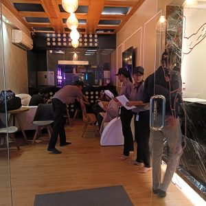The image of an event where few volunteers are actively working.